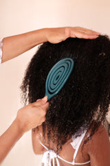 Brosse à cheveux démêlante